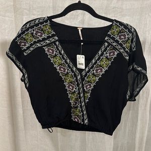 NWT Free People cropped, flowy top. Size XS.